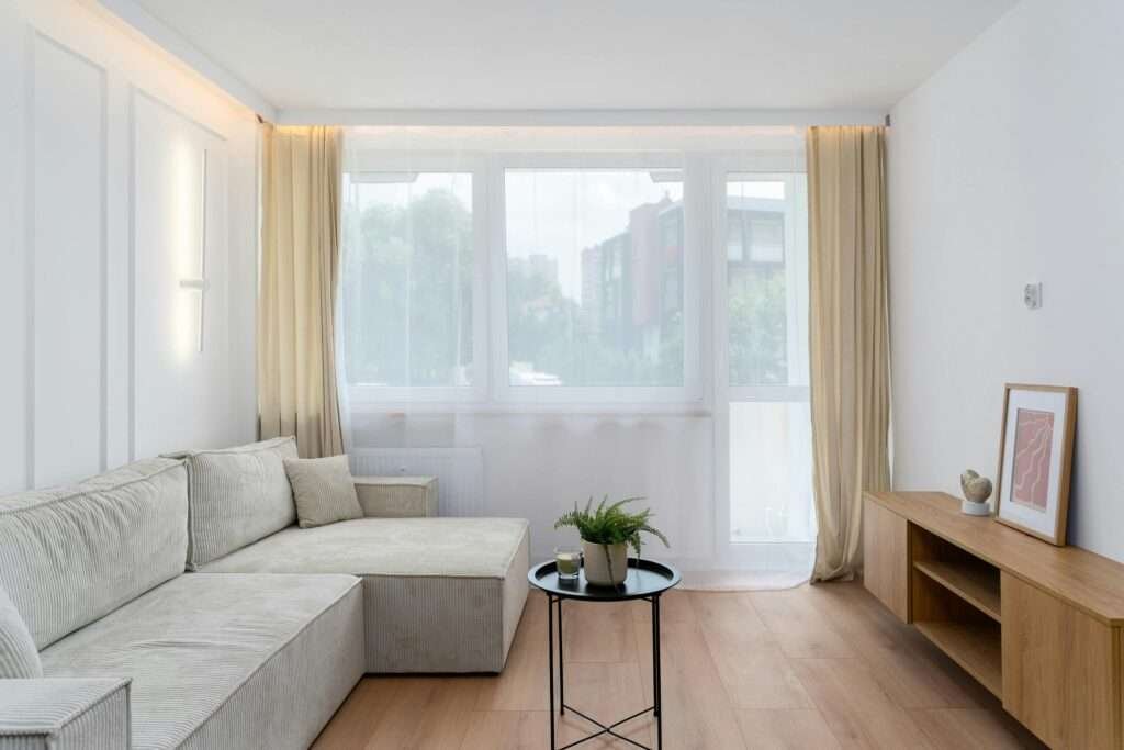 Professional garage conversion in Wolverhampton by Best Hommes, featuring a modern, light-filled living room transformation that meets all UK building regulations and planning standards.