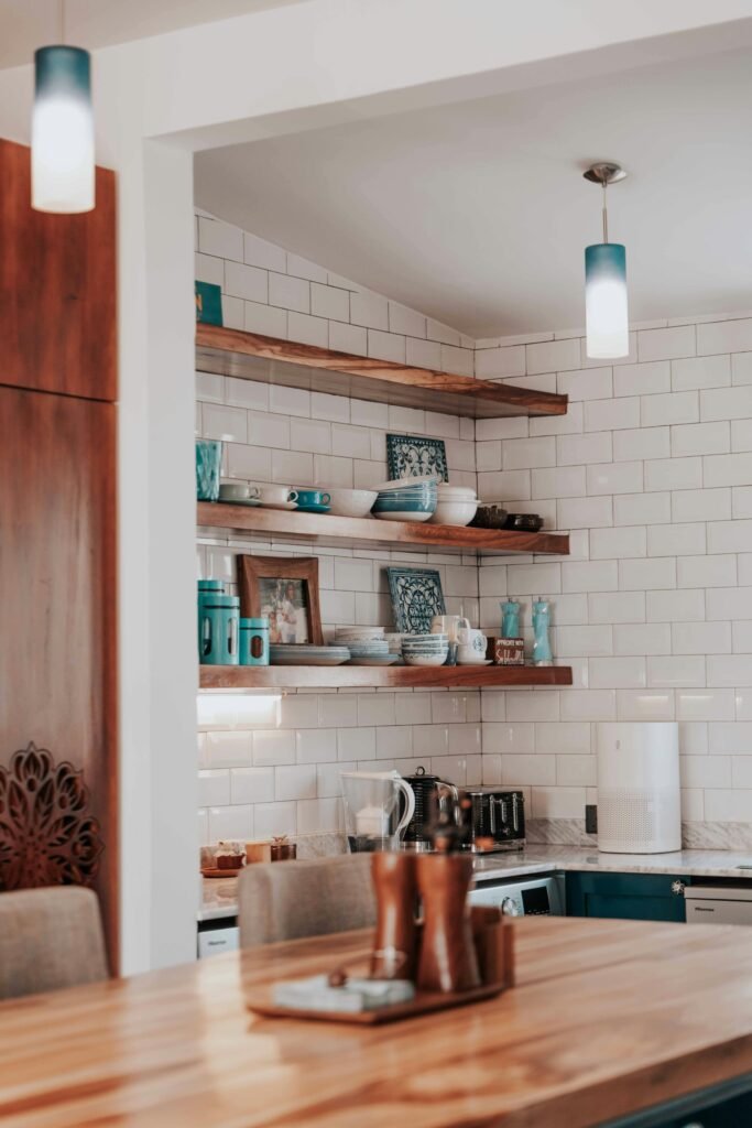 Dudley kitchen: Space-saving wall-mounted shelves maximize storage in compact homes. Stylish, practical solutions. Location: Dudley, United Kingdom